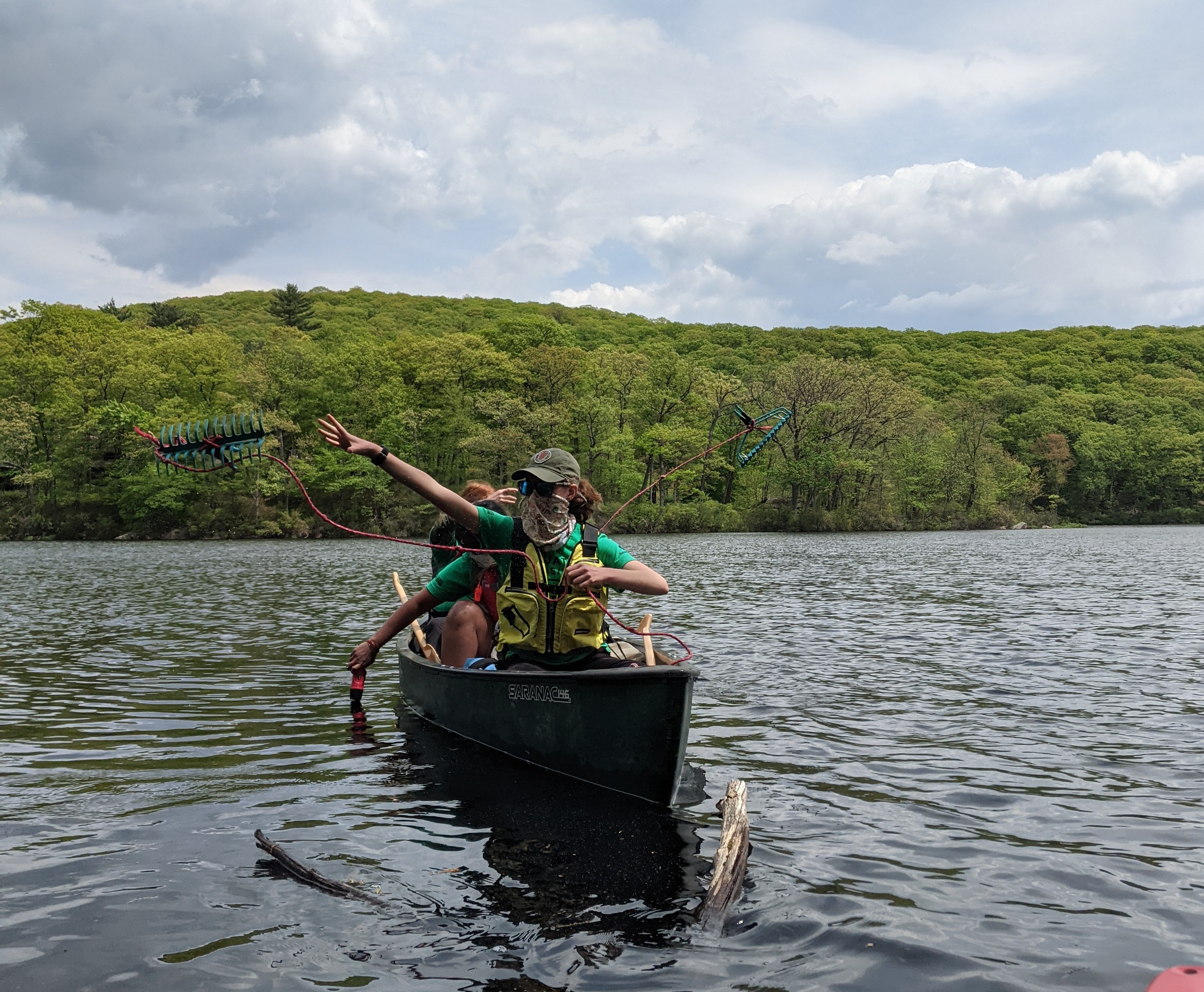 Aquatic Invasives Strike Force Rake Toss. Photo by Maya Thompson